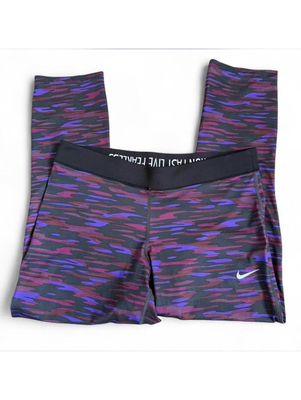 Nike women’s purple camouflage leggings